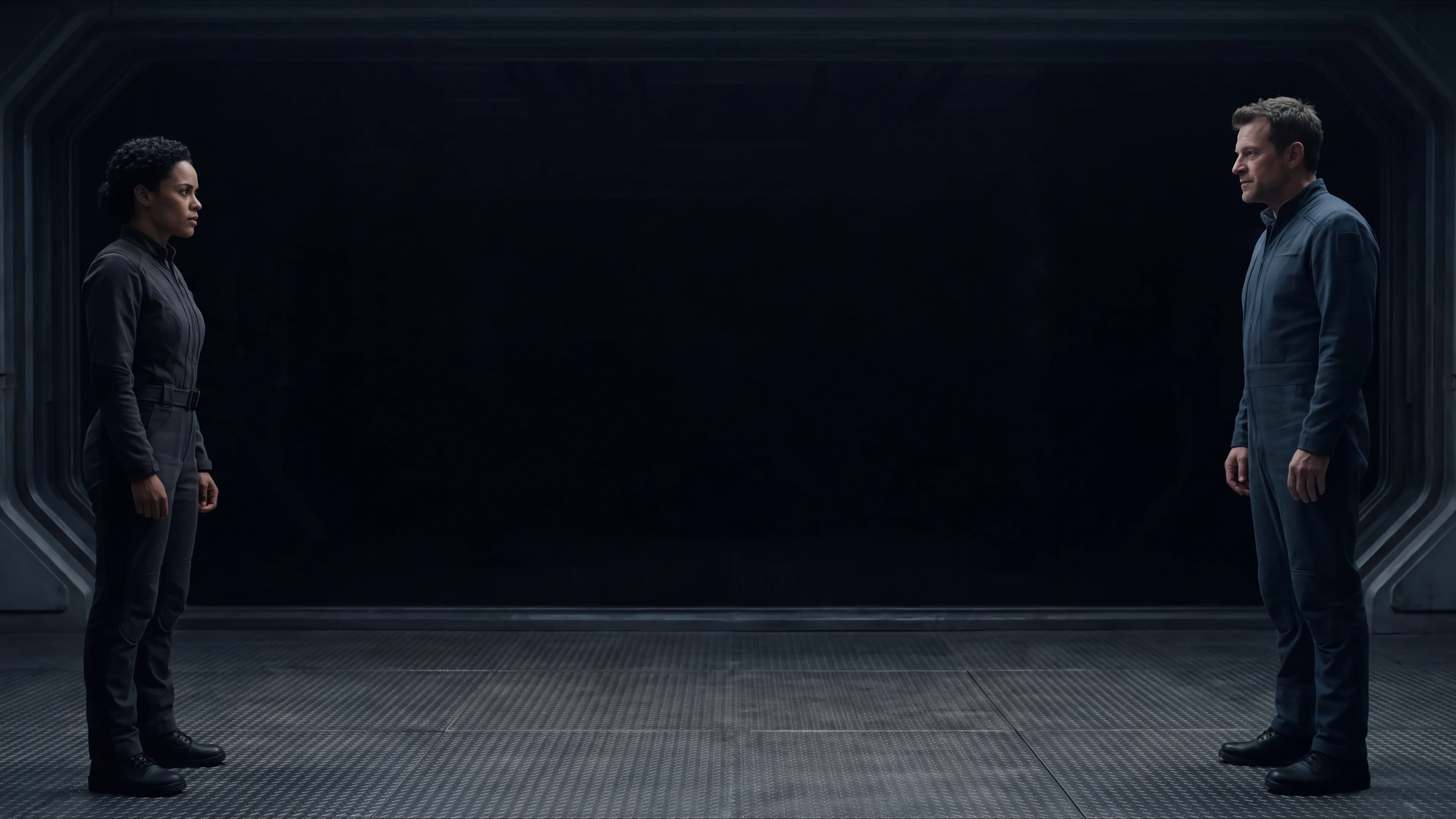 Enemies to lovers sci fi romance: the two human leads facing each other from opposite ends of a darkened warship deck, a full pace of empty floor between them